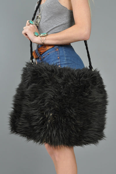Massive Shearling Fur Bag with Buckskin Strap